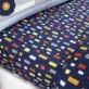 Construction Fitted Sheets by Catherine Lansfield in navy, with pops of primary colours in playful geometric shapes would add the finishing touches to any kids room.