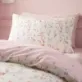 Twirl into a world of grace and elegance with the enchanting Ballerina Toddler Duvet Set from the Belle & Boo range.