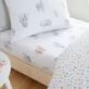 Zoo Animal Toddler Fitted Sheets in 100% Cotton from Little Bianca featuring hand drawn safari animals, will help complete your Jungle theme kids room.