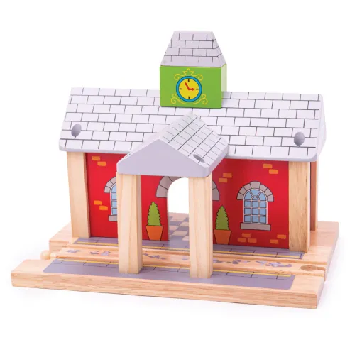 This Bigjigs Toys Railway Station is a realistic wooden train accessory, which stands out thanks to its bright red walls, grey roof and green clock tower.