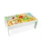 This Bigjigs Train Set and Table is is packed with play features and wooden train track accessories, including a shipping crane, houses, trees, traffic signals, people and a miniature car for the roadway section.