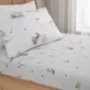 This Bunny Rabbit Friends Toddler Fitted Sheet is made by Little Bianca from 100% Cotton, featuring adorable Bunnies on a fresh white background.