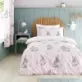 Bunny Tails Toddler Duvet Cover Set by Catherine Lansfield is a fully reversible bedding set blissfully adorned with, a playful bunnies and blossom design.