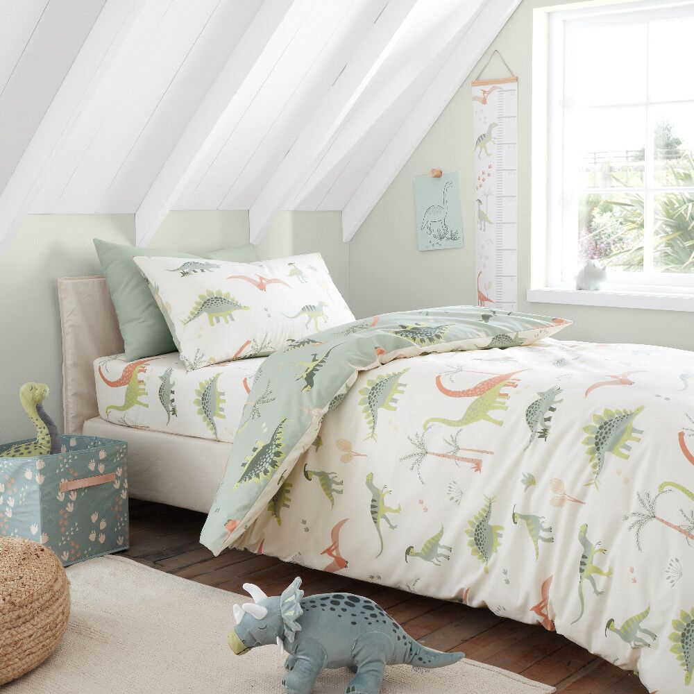 Dinosaur Toddler Duvet Set by Chapter B is a reversible kids bedding set featuring all their favourite Dino friends, in wonderful natural colours.