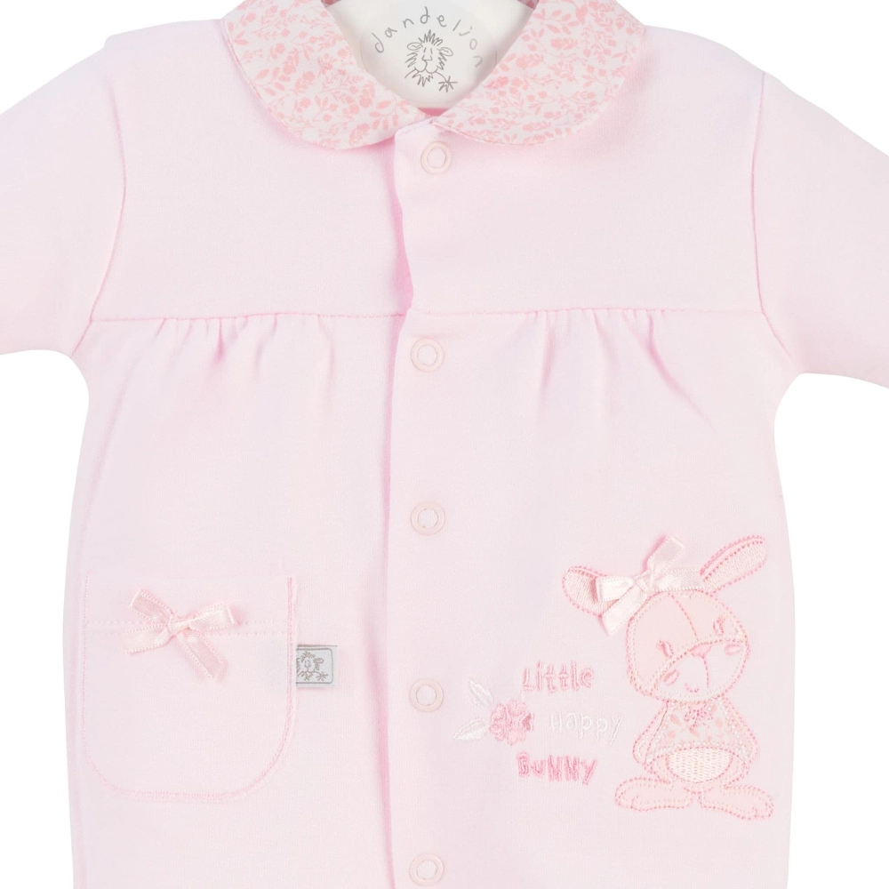 This Dandelion Little Happy Bunny Cotton Sleepsuit comes in a soft pink and features a cute bunny appliqué with bows.