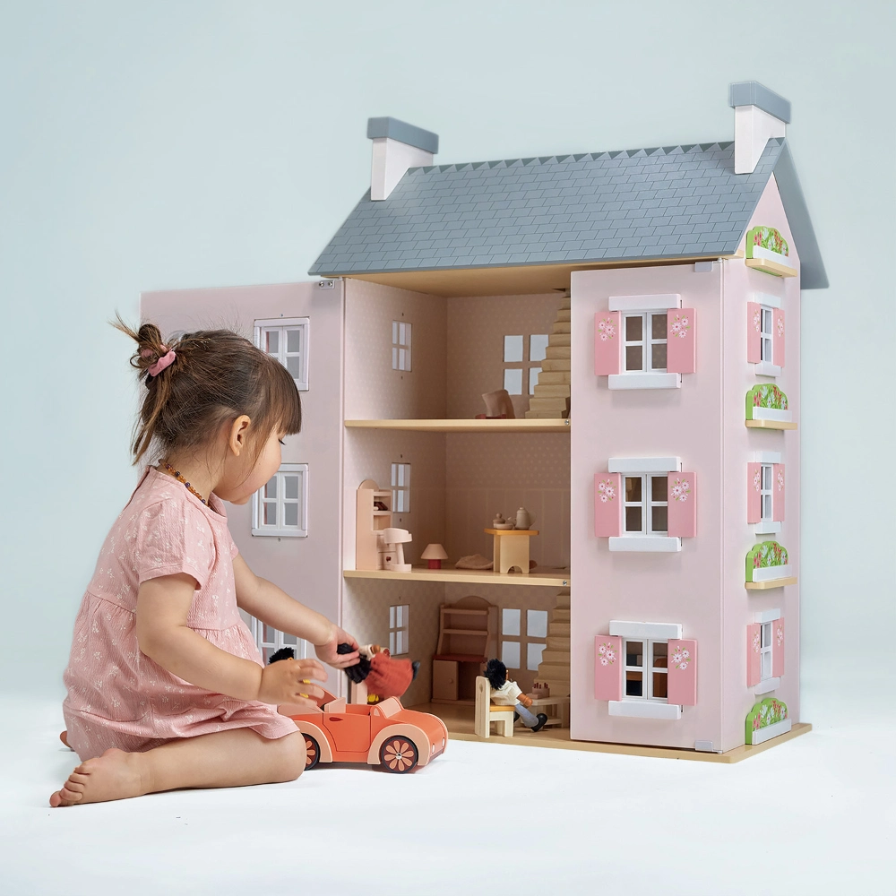 This beautifully crafted dollhouse offers endless opportunities for imaginative play and storytelling