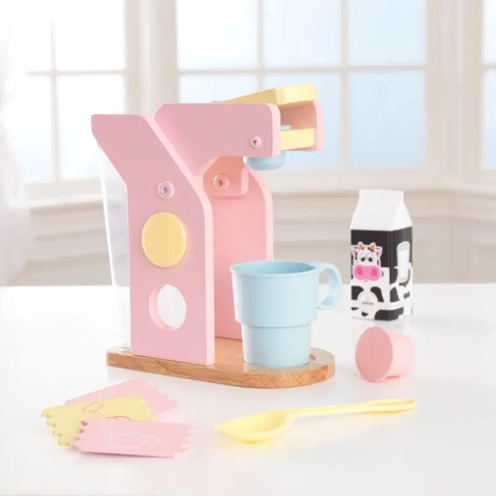 Kidkraft Pastel Coffee Set comes complete with a cup, spoon, sugar packets, milk and coffee pods, everything a budding coffee aficionados would need.