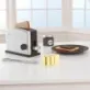 Kidkraft Toaster Espresso comes with bread, a butter knife, jelly and a stick of butter that kids can really slice