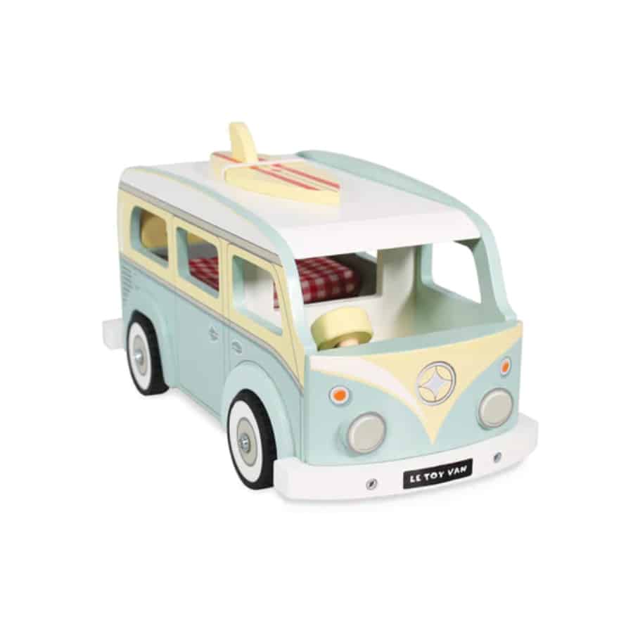 Le Toy Van Holiday Camper Van is a vintage inspired wooden holiday campervan, finished in pastel mint green and cream hues,