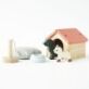 Le Toy Van Pet Set would be an ideal accompaniment to any wooden Dolls House, featuring a dog and kennel, food bowl, cat, cat scratcher and fluffy pet bed