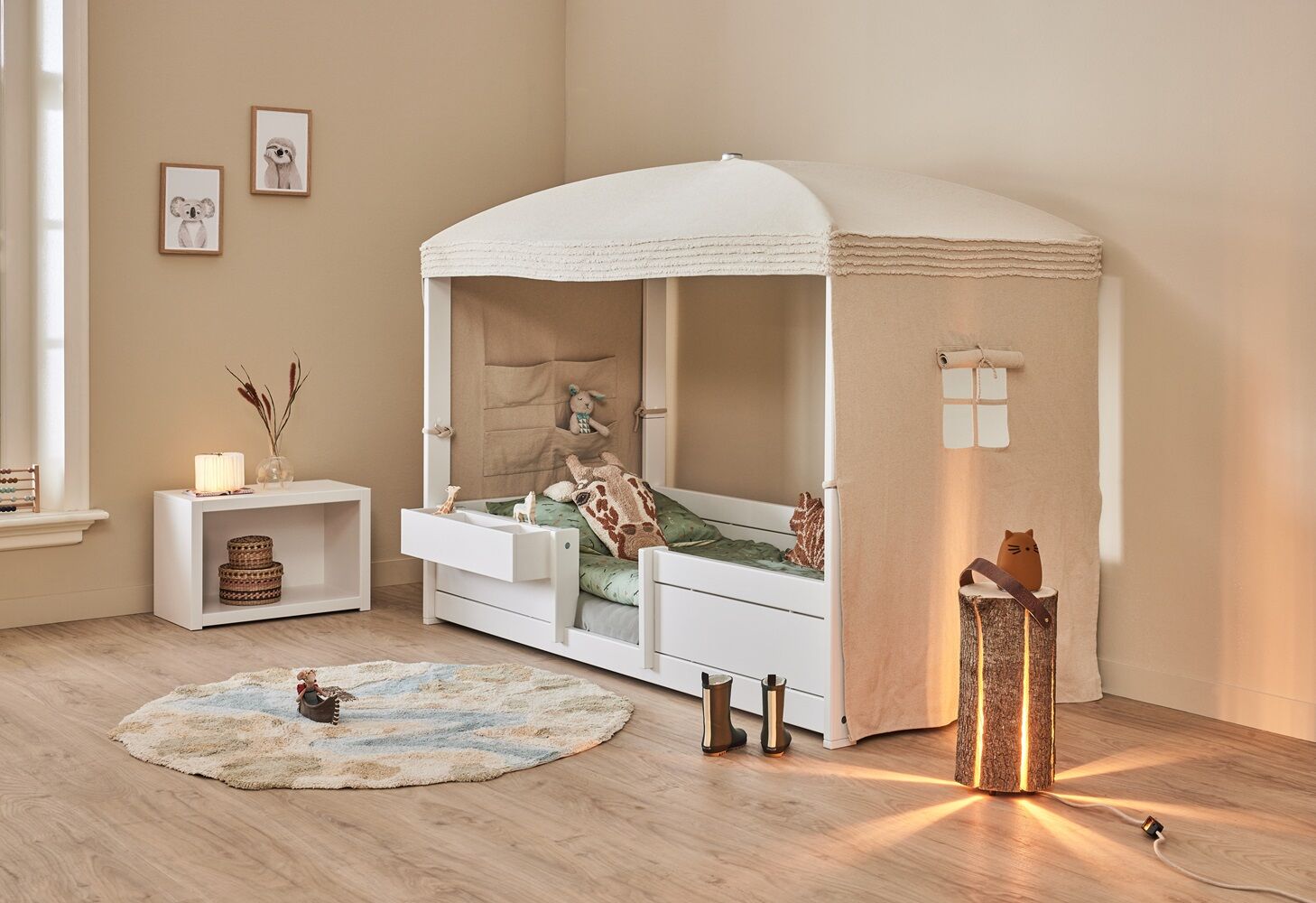 Lifetime 4 in 1 Bed - Canopy Essence Natural is a ingenious kids bed, which starts off as a very low four poster bed for your toddler that can be raised as they get older all the way to a midi bed, and converted back to a full sized single bed.