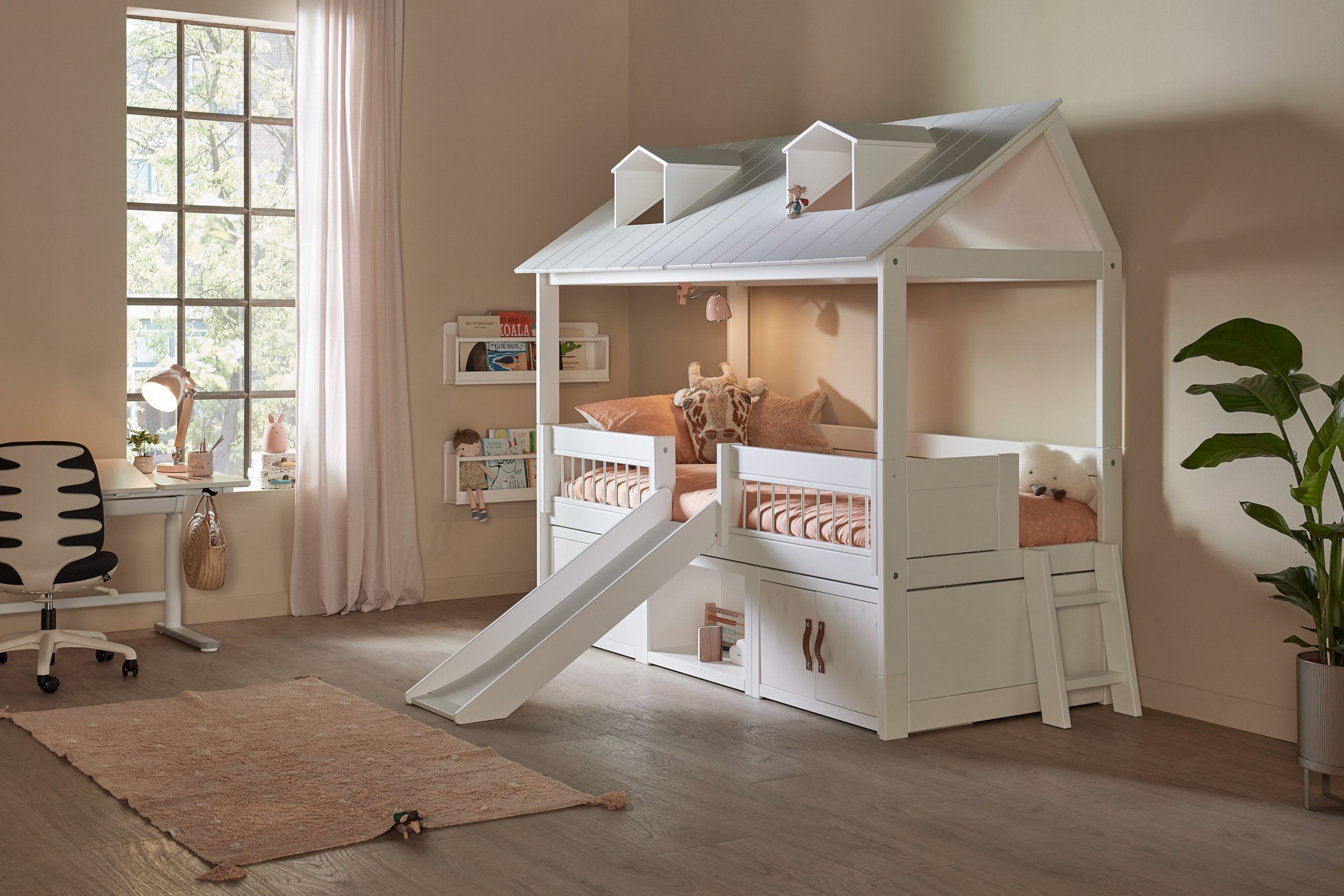 Lifetime Beach House Cabin Bed With Slide is a Play House Bed with roof windows, garden fence-like guarding, and under bed storage, that would be a wonderful place for any child to play, rest and dream.