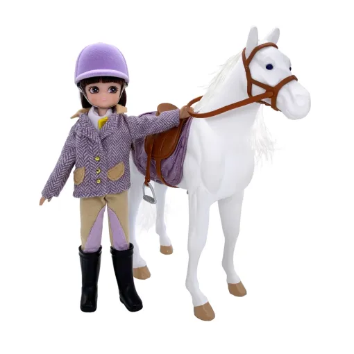 Lottie Pony Pal Adventure Set, features Lottie and her trusty white Welsh Pony, Shelby. Lottie is suitably dressed for a day filled with equestrian adventures. She wears a tweed jacket, white shirt, riding trousers, and black boots.