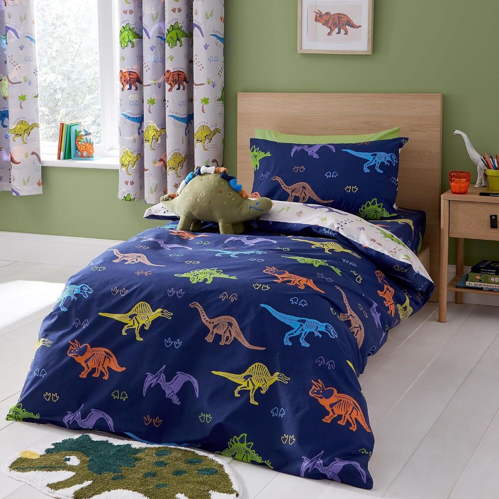 This Prehistoric Dinosaur Single Bed Duvet Cover Set will inspire the imagination of any young dinosaur enthusiast. Fully reversible, with a deep navy base, giving you two looks in one and created from easy-care and durable polycotton fabric for everyday use.