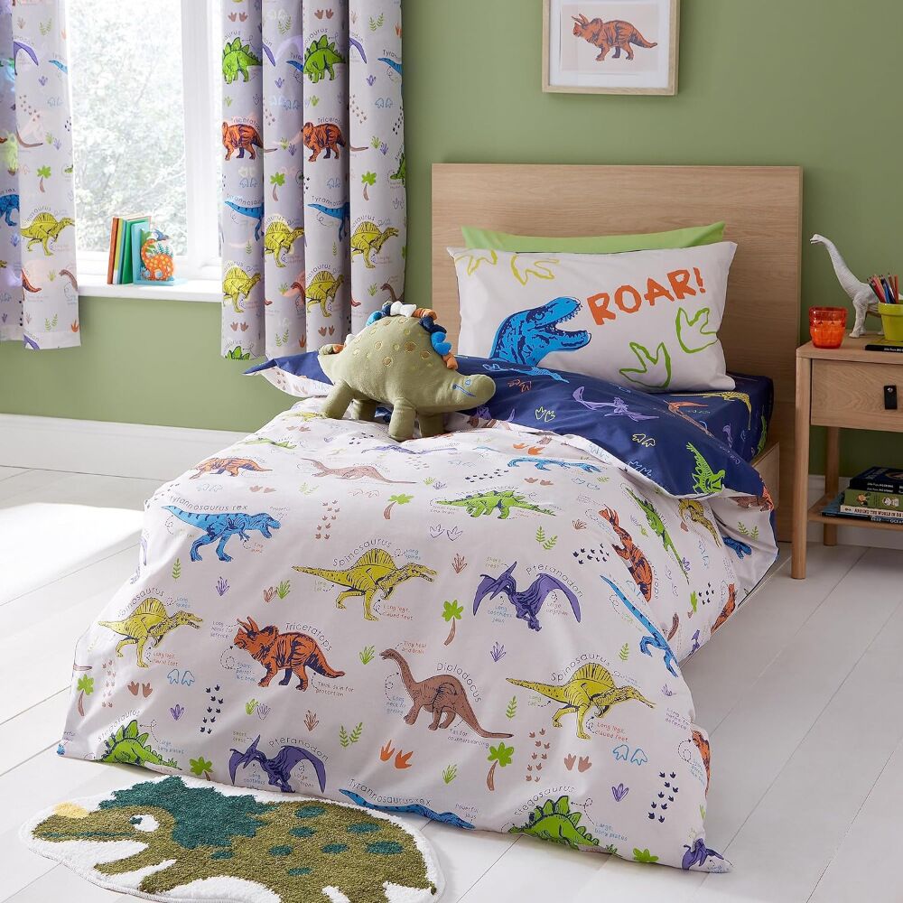 Prehistoric Dinosaur Toddler Duvet Cover Set, fully reversible, with a navy base, giving you two looks in one, created from easy-care and durable polycotton