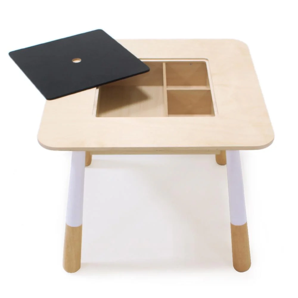 This Tender Leaf Forest Table is a sturdy plywood and rubber wood children’s table with a central removable panel that can be used as a chalk board