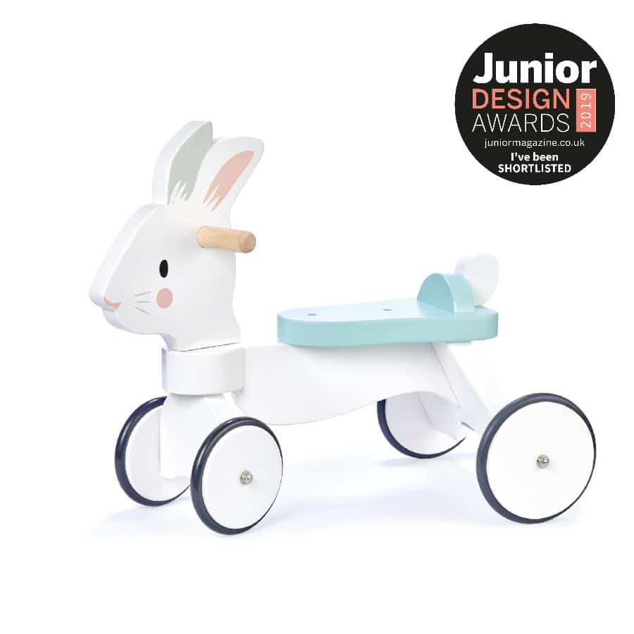This Tender Leaf Toys Running Rabbit Ride-On is a classic sturdy white ride on wooden toy bunny with non-slip rubber trimmed wheels, made from solid rubber wood.
