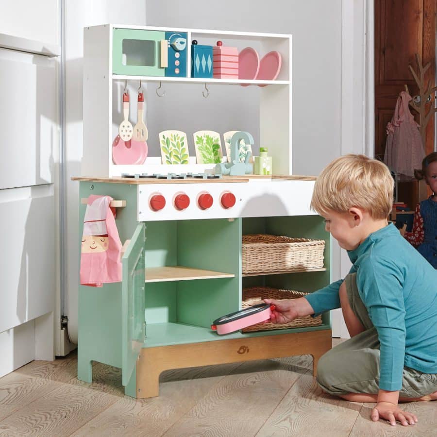 Tenderleaf Toys Kitchen Range is a beautifully designed wooden play kitchen, complete with accessories and wicker basket drawers