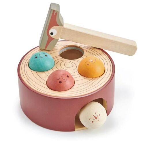 Tenderleaf Toys Woodpecker Game is hammer game for those active toddlers who love to bash things! The game is designed like a tree trunk, bash the four coloured balls