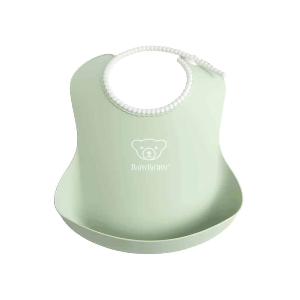 Babybjorn Soft Bib Powder Green is ergonomically designed to fit your child’s body perfectly and has a deep pocket to catch food spills